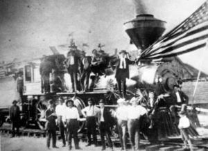 People standing by a train